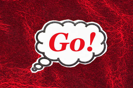 Go! The text of the motivation of the incentive to action. An inscription in the information cloud.の写真素材