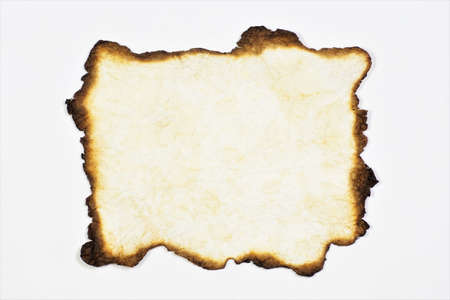 Vintage parchment with burnt edges. A writing canvas, a background for text, design and creativity.の写真素材