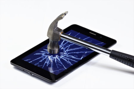 Cracks on the smartphone screen from destruction by a hammer. Malfunction, subject to repair.