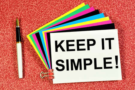 Keep it simple! The inscription of the concept of inspiration on colored stickers. Easy to understand and easy to use solutions, does not require a lot of time.の写真素材