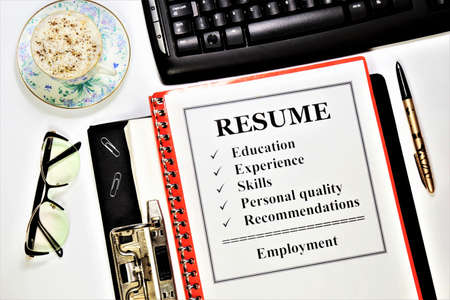 Resume. The inscription in the planning folder. Professional qualities that are important for a successful career: education, knowledge and skills.の写真素材