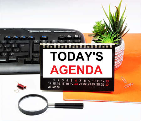 Today's agenda. An inscription in the planning calendar. A list of topical issues discussed at a meeting, seminar or conference.の写真素材