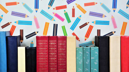 Books have different covers. A source of important knowledge, a literary, scientific work, a collection of text and graphic information, are stored in the library.の写真素材