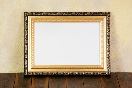 An empty frame on a wooden background for decoration and holiday design and text information.の写真素材