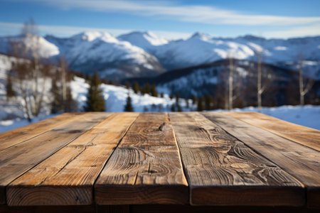 Wooden deck table with blurred snow background professional photographyの素材