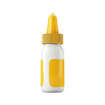 White plastic bottle with a yellow label and a yellow dropper cap is shown against a white background.  The bottle has a simple, modern design.の素材