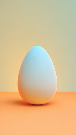 An egg-shaped object with a blue and yellow gradient, placed on an orange surface.の素材