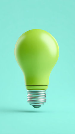 A green light bulb against a blue background, symbolizing ideas and innovation.の素材