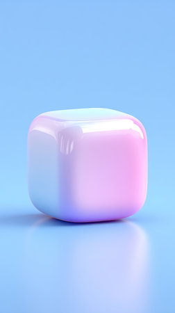 A close-up of a soft pastel cube on a light blue surface, with a gradient of pink and blue.の素材