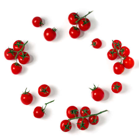 Layout made of cherry tomatoes on the white background.の写真素材