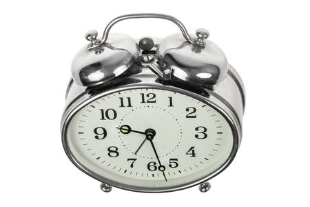 Vintage alarm clock over white background