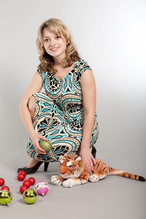 Prenew Year's photosession of the beautiful girl with various attributesの写真素材