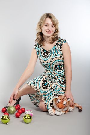 Prenew Year's photosession of the beautiful girl with various attributesの写真素材