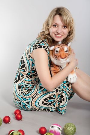 Prenew Year's photosession of the beautiful girl with various attributesの写真素材