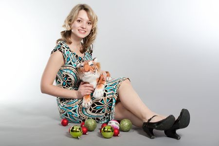 Prenew Year's photosession of the beautiful girl with various attributesの写真素材