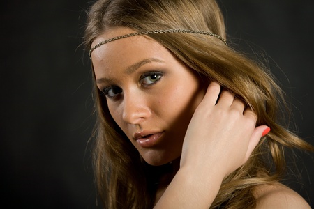 Beautiful Long Haired Girl On A Black Background Royalty Free