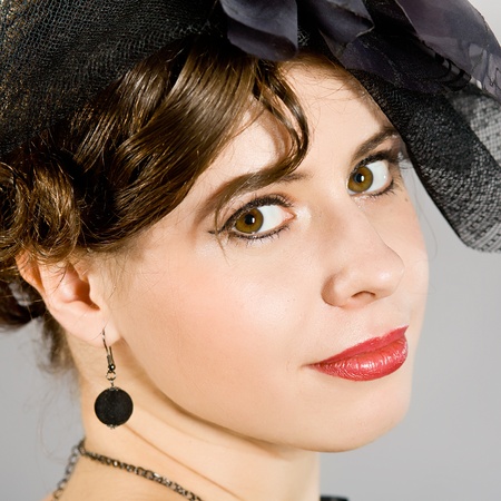The effective girl in a beautiful hat