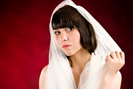 Portrait of an attractive girl in a white clothの写真素材