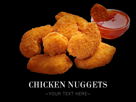 Close up to Portion of crispy chicken nuggets with sweet and sour sauce isolated on black background. Ready fast food menu banner with text and copy space. Fast food dish objectの写真素材