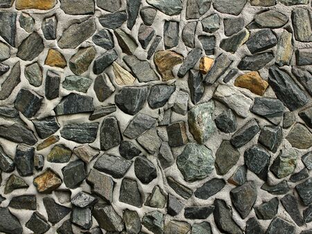 Large stones in concrete texture exterior finishing homeの写真素材