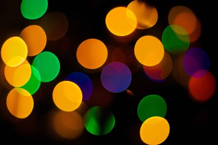 New Year Background with defocused lights of a fir treeの写真素材