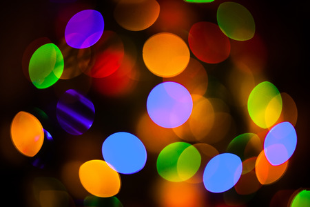 Christmas Background with defocused lights of a fir treeの写真素材