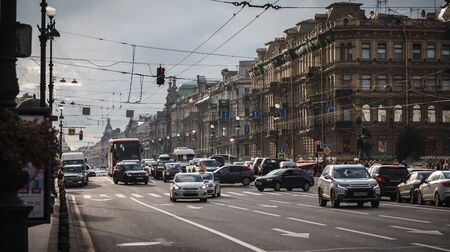 Saint Petersburg, Russia, August, 7, 2017 - Heavy car traffic on the Nevsky prospect. View to corner of House of merchant Sharov, or Profitable House of P.I. Likhachev. Nevsky Prospect, 66. Architect A.V. Ivanovのeditorial素材