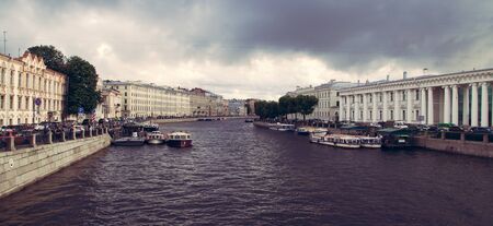 Saint Petersburg, Russia, August, 7, 2017 - View to Fontanka River from Anichkov Bridge. Toned Photo. Panorama aspect ratio.のeditorial素材