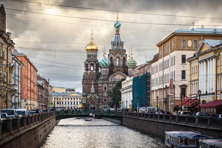 Saint Petersburg, Russia, August, 7, 2017 - View of the Church of the Savior on Spilled Blood  (Spas na Krovi) from the  Griboyedov Channel. Storm clouds.のeditorial素材