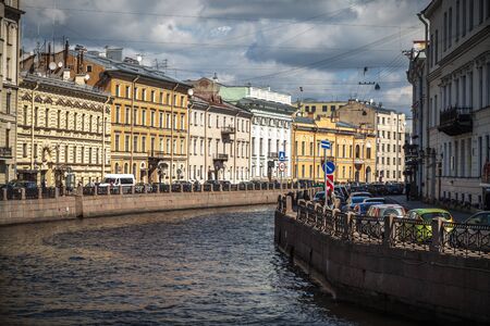 Saint Petersburg, Russia, August, 8, 2017 - Embankment of Moyka River. Sunny weather with storm clouds.のeditorial素材