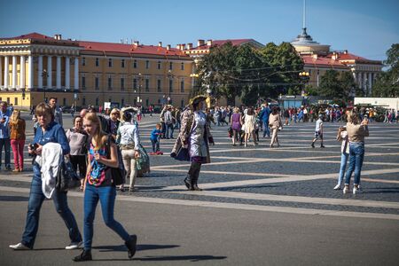 Saint Petersburg, Russia, August, 8, 2017 - People are walking on the Palace Square. One of them dressed as Emperor Peter I.のeditorial素材