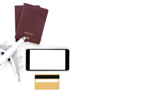 Mock up image of golden credit card , mobile smart phone with blank white screen, passport and...
