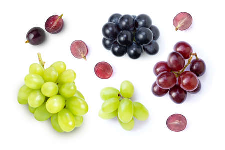 Various grapes fruit and half sliced isolated on white background. Top view. Flat lay.の写真素材