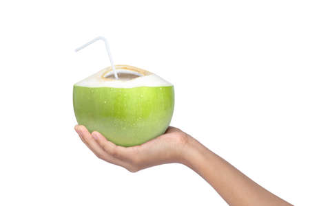 hand holding Coconut water isolated on white background. (with clipping path)の写真素材
