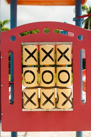 Tic Tac Toe - top and bottom row crosses and middle zeroの写真素材
