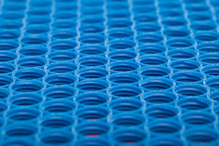 Blue and red plastic caps backgroundの写真素材