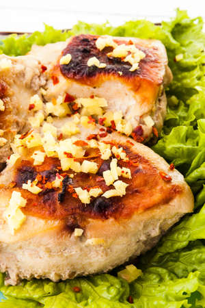 Asian style spicy chicken breast baked in ginger-yoghurt marinade with wasabiの写真素材
