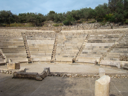 the ruins of ancient buildings from the ranks of benches