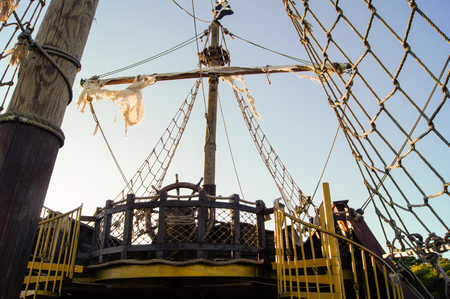 The steering wheel on the bridge of the old shipの写真素材