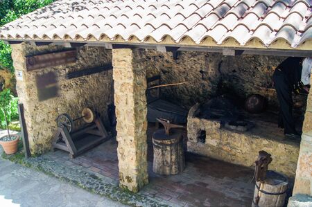 small smithy with tools and devices under the roofのeditorial素材