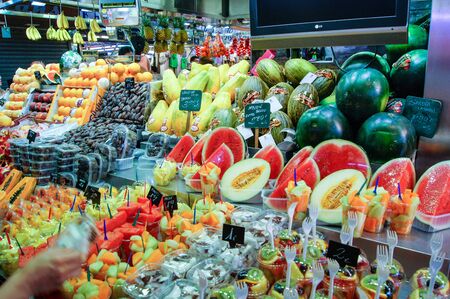 Barcelona market, Spain - August 1, 2015.Countertop with watermelons, melons and other fruits.のeditorial素材