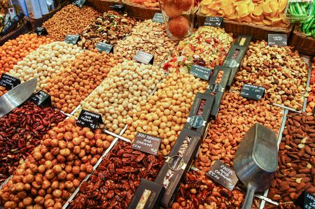 Barcelona market, Spain - August 1, 2015.Trays with different nuts.のeditorial素材