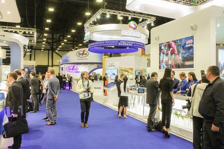 St. Petersburg, Russia - 6 October, 2015.Expo forum. International Gas Forum. Large numbers of people are between the stands of companies.のeditorial素材