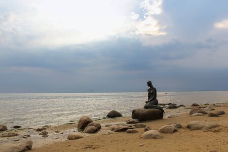 mermaid on a rockの写真素材