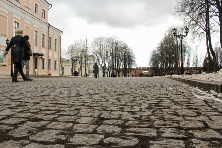 Old paving stones of the Novgorod Kremlin. Buildings and monuments in the territory of the Novgorod Kremlin.の写真素材