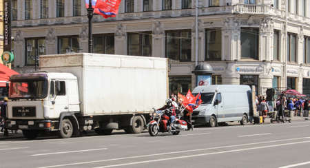 Biker with flags of victory. Celebration day of victory in the center of St. Petersburg.のeditorial素材