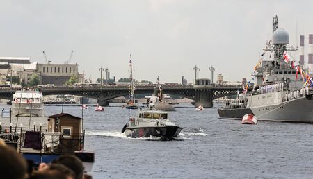 Military parade of ships. Festive parade of warships on the Neva River in St. Petersburg.のeditorial素材