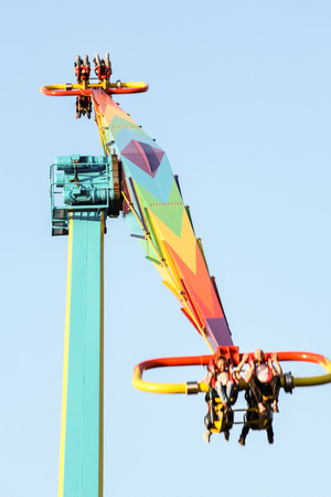 Most extreme carousel. Amusement and extreme rides for teenagers and adults.のeditorial素材