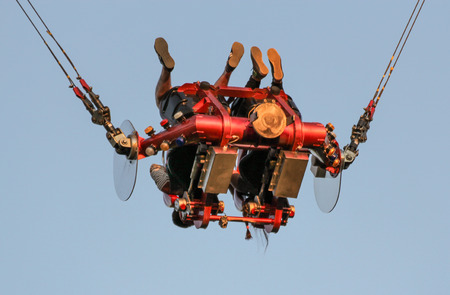 People in an open capsule. Amusement and extreme rides for teenagers and adults.のeditorial素材