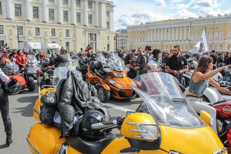 A large cluster of motorcycles and people. The annual parade of Harley Davidson in the squares and streets of St. Petersburg.のeditorial素材